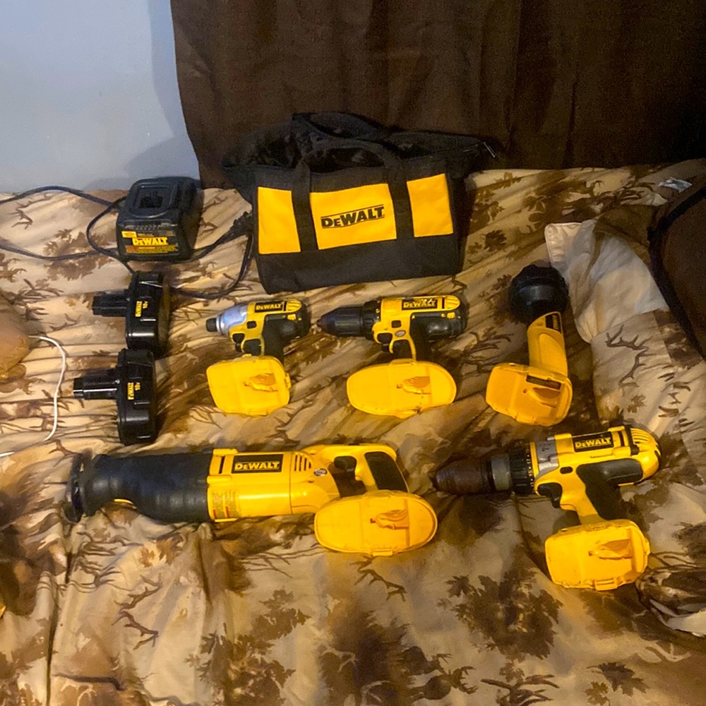 A regular drill, hammer drill , impact drill , sawzall , and flashlight